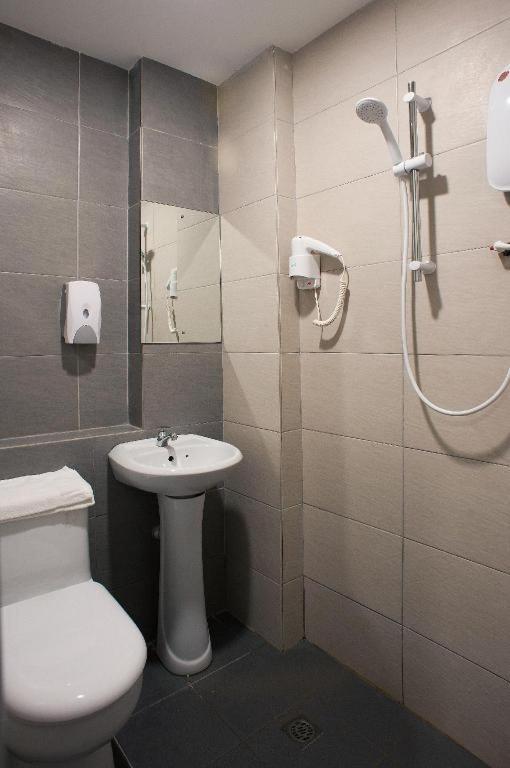Econtel Queensbay Sungai Dua Bukit Экстерьер фото