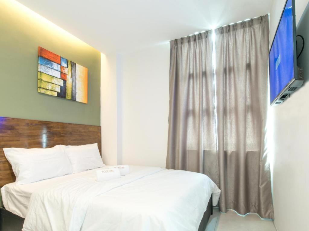 Econtel Queensbay Sungai Dua Bukit Экстерьер фото